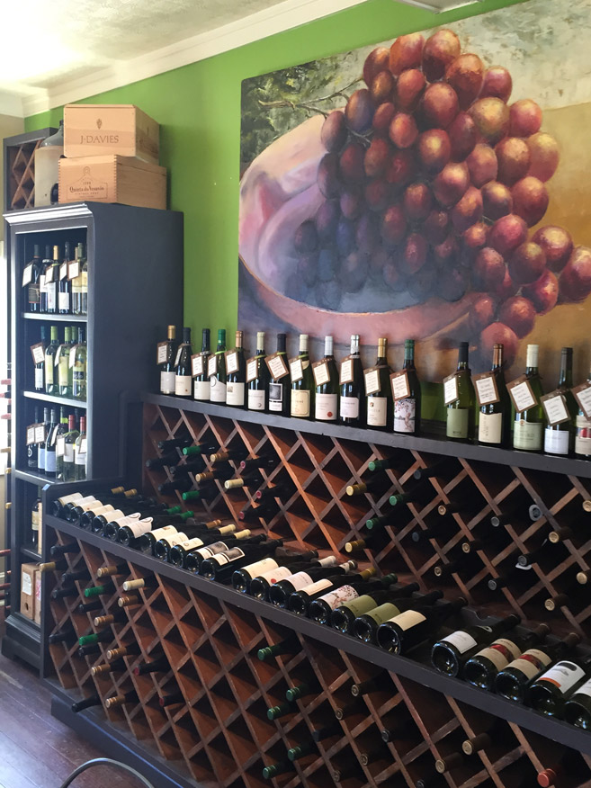 The Brown Jug has a carefully curated selection of wine to enjoy with a cheese plate or sandwich on their outdoor patio.